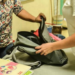 Demandan agilizar revisión de mochilas.
